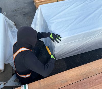 Worker packaging a load from the moulders and getting ready for shipment